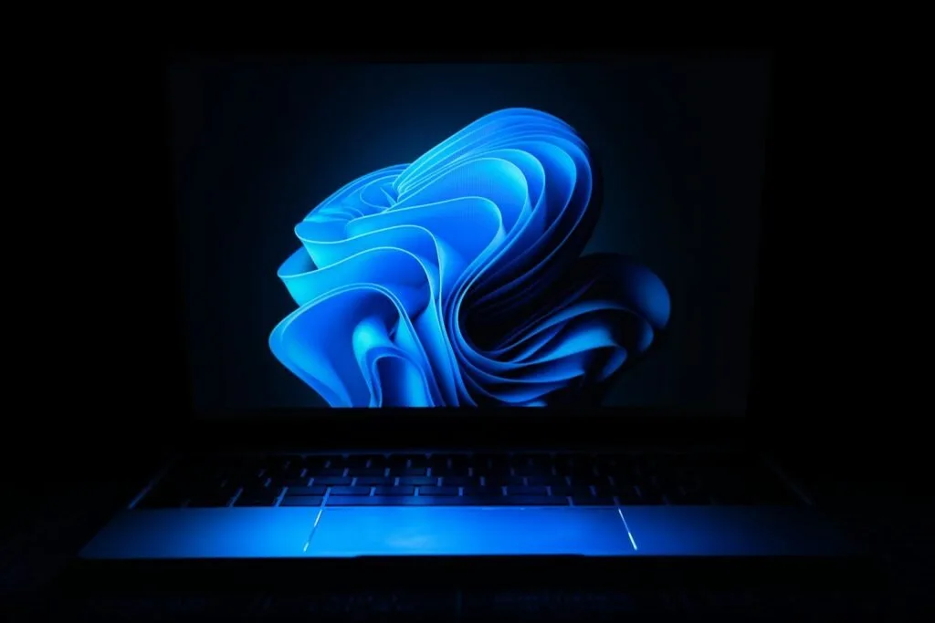 A Macbook Air Laptop In The Dark