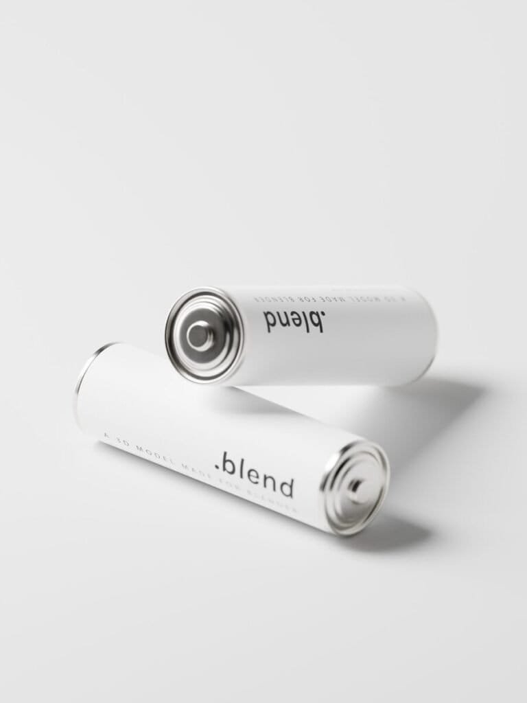 A Couple Of Batteries Sitting On Top Of Each Other