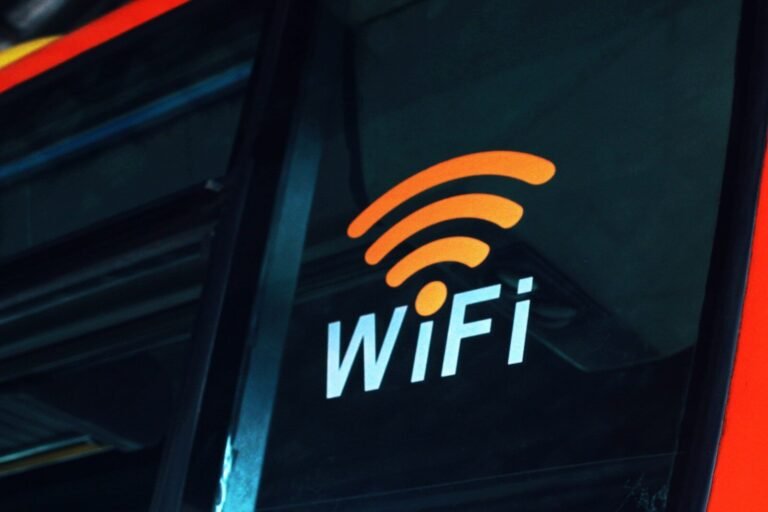 A Close Up Of The Wifi Logo On The Side Of A Bus
