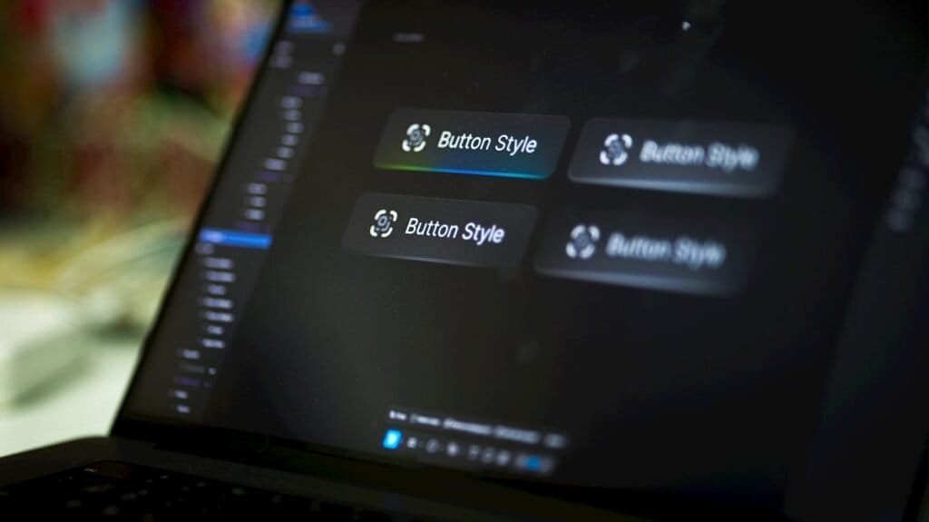 Laptop Screen Displays Four Button Style Options.