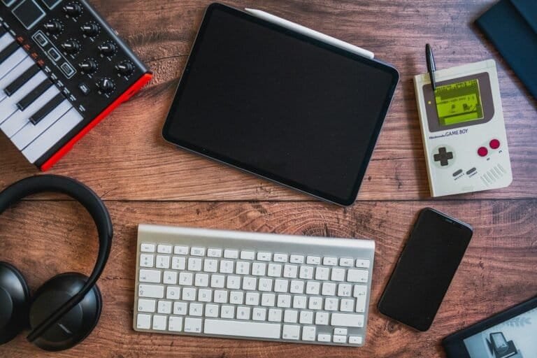 Black Ipad Beside Apple Keyboard And Apple Magic Mouse