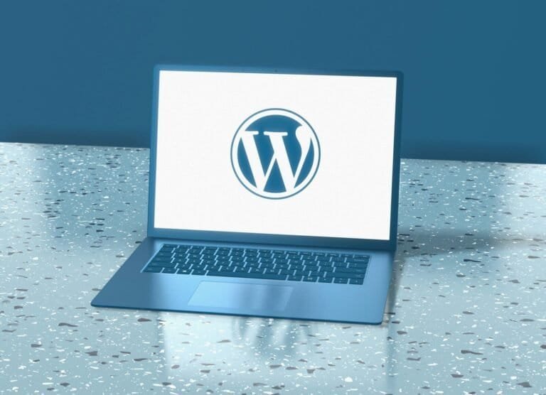 A Laptop Computer Sitting On Top Of A Table